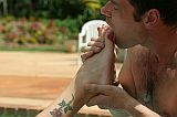 holding pussy lips and smoking cigarette